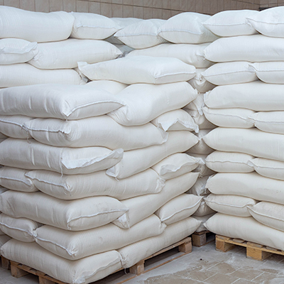 sacks,of,flour,on,a,pallet.,flour,in,the,bags.