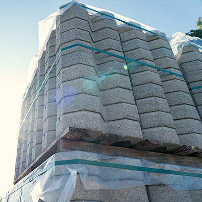 large,pallet,of,patterned,concrete,pavers,or,blocks,wrapped,in